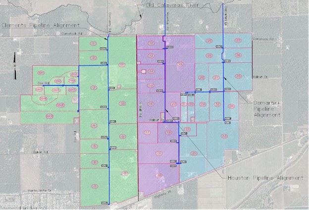 A map showing land divisions with color-coded sections, pipeline alignments, and numbered plots. Includes paths and a river.