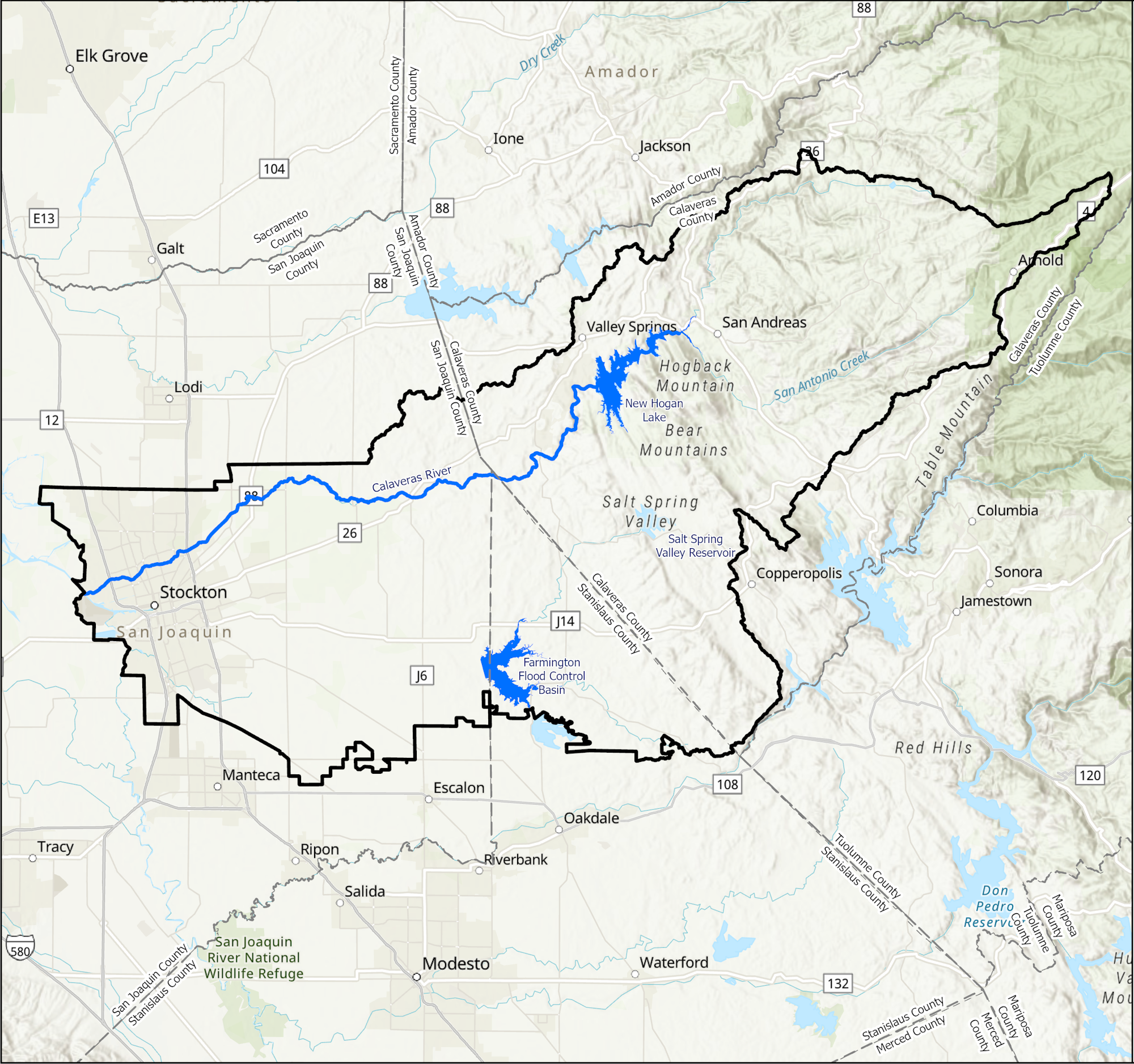 A map showing a region with water bodies, boundaries, and city names.