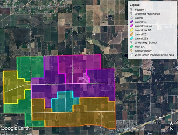 A satellite map showing various colored zones with a legend indicating locations and service areas, including schools and wineries.