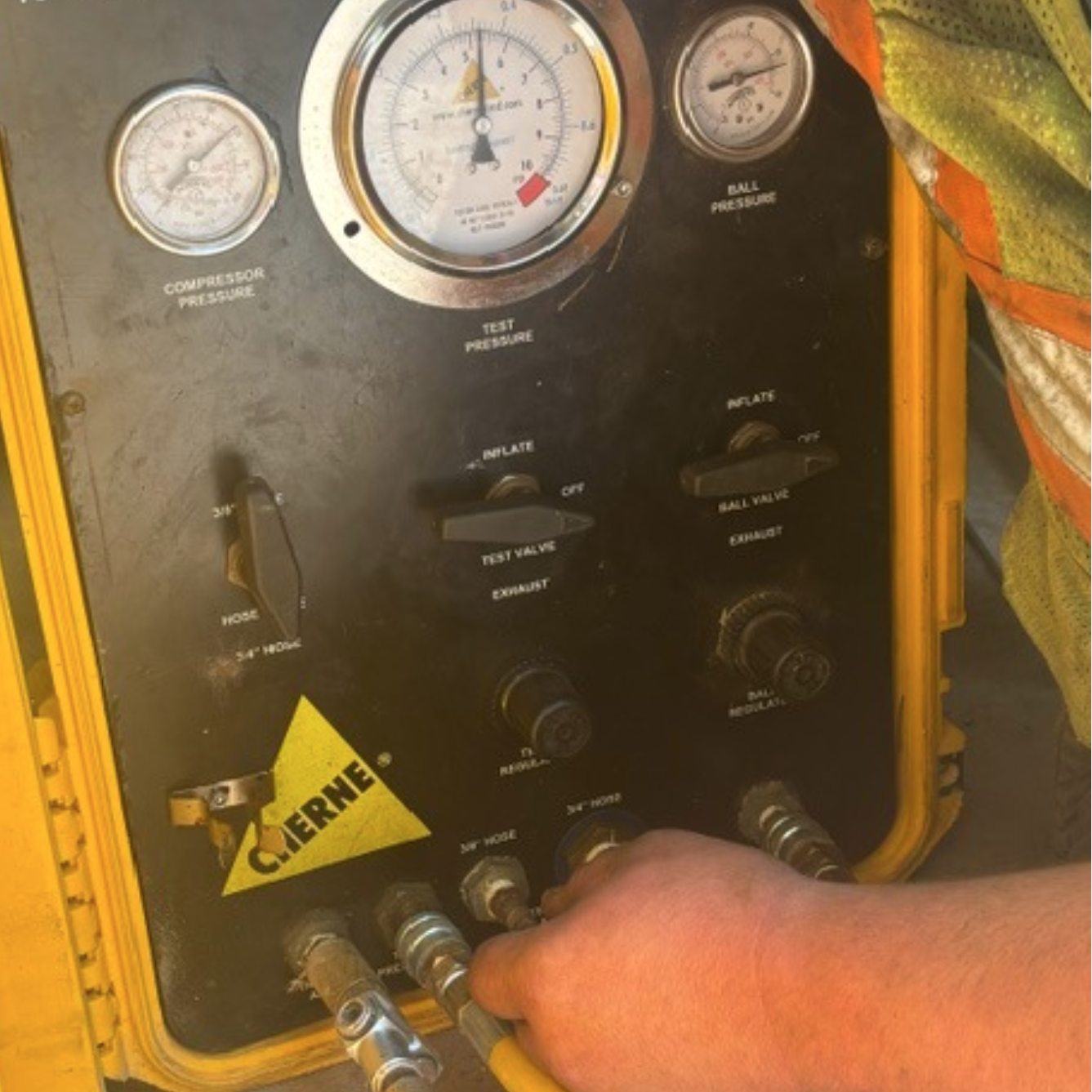 The image shows a control panel with gauges and valves, likely used for pressure testing and inflation in industrial applications.