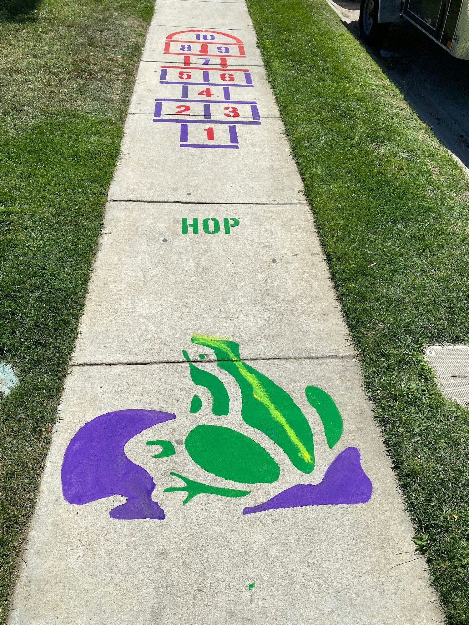 Sidewalk, with painted artwork