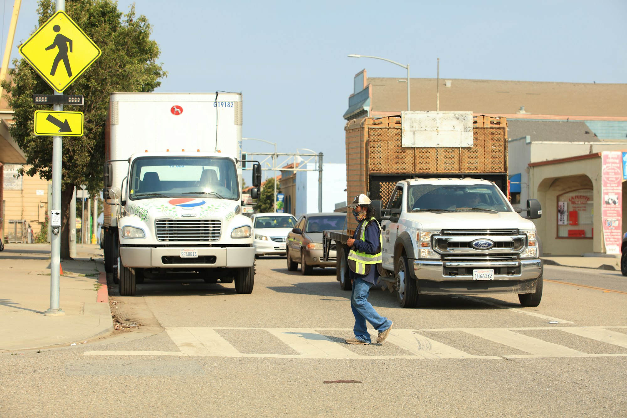 May contain: vehicle, truck, transportation, human, person, car, automobile, footwear, shoe, clothing, apparel, and van
