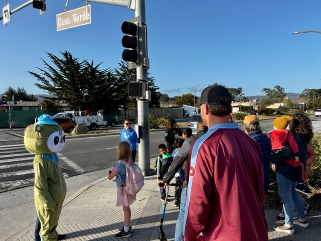 May contain: person, human, traffic light, light, and pedestrian