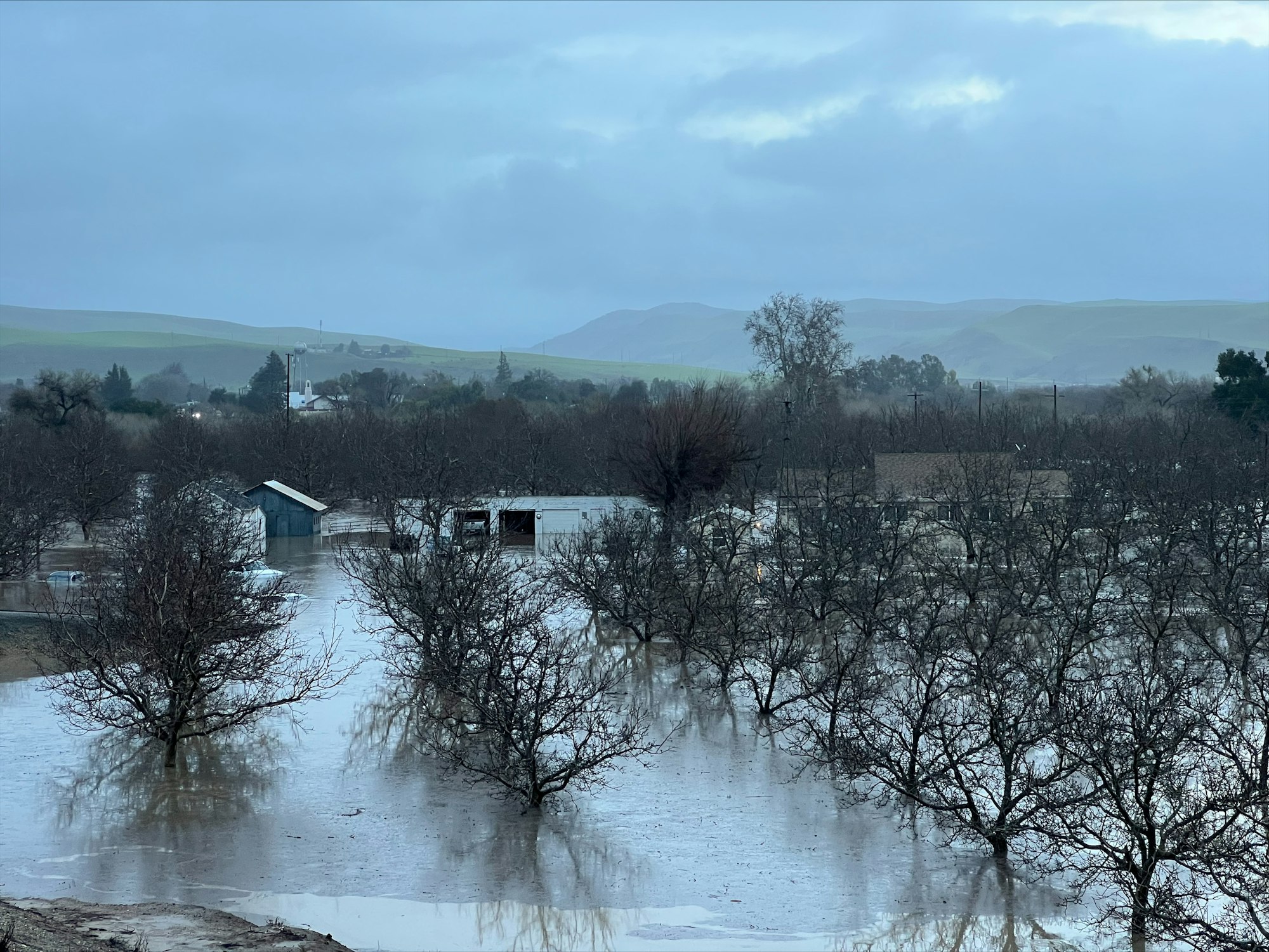 May contain: hut, nature, outdoors, countryside, rural, building, architecture, shelter, water, scenery, car, vehicle, and transportation