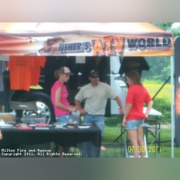 Photo of people near an event booth