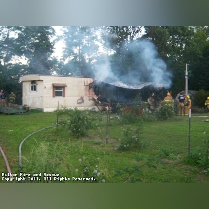 Photo of firefighters at a home fire