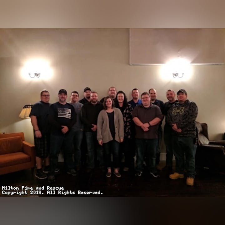 Photo of a group of people gathered at an awards dinner