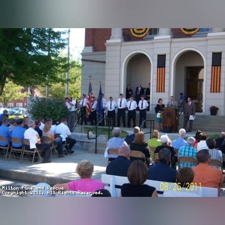 Photo of people at a gathering outside