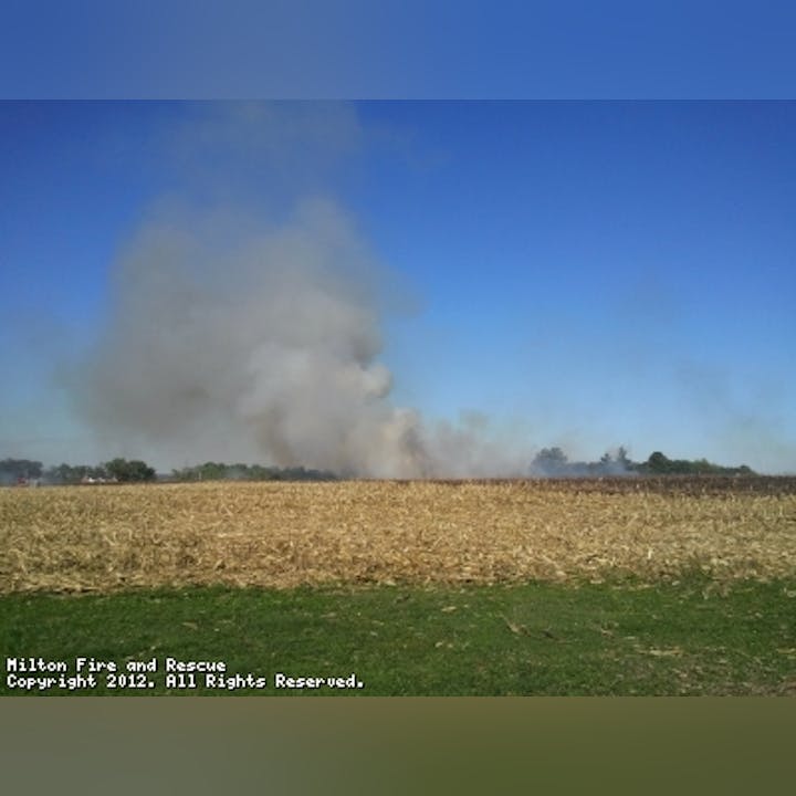 Photo of smoke over a field