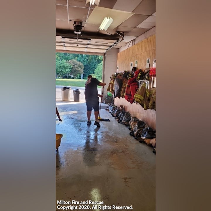 Photo of a person sweeping