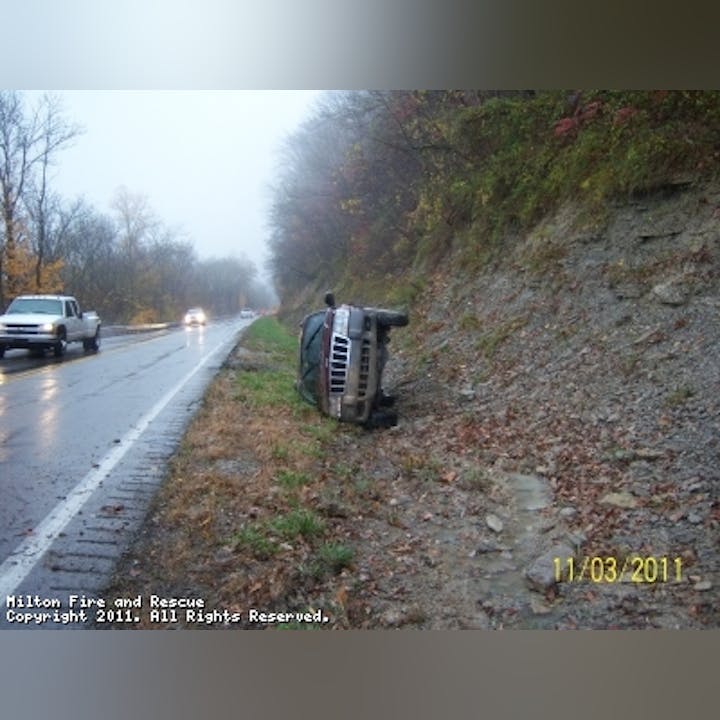 Photo of a vehicle turned up on it's side