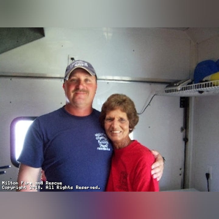 Photo of two people hugging