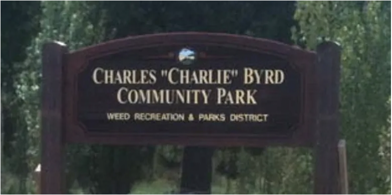 sign reading charles charlie byrd community park