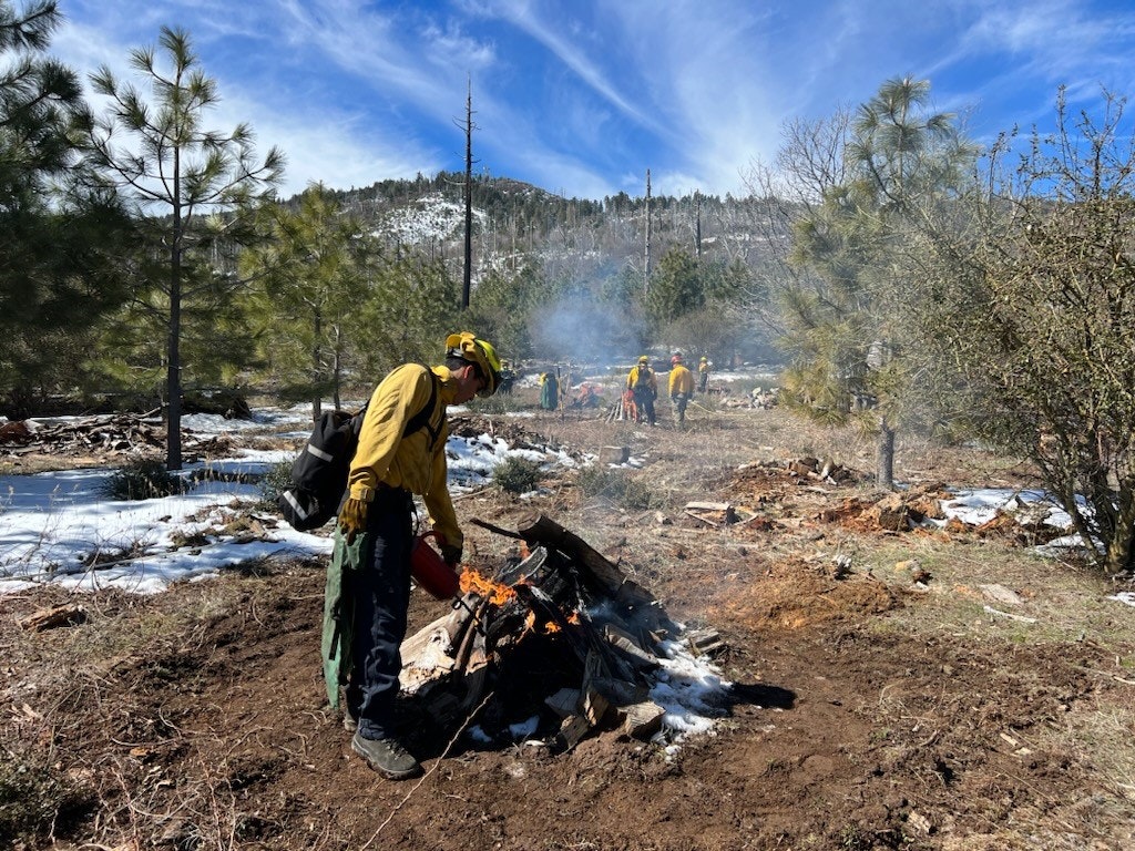 May contain: nature, outdoors, wilderness, person, clothing, and glove