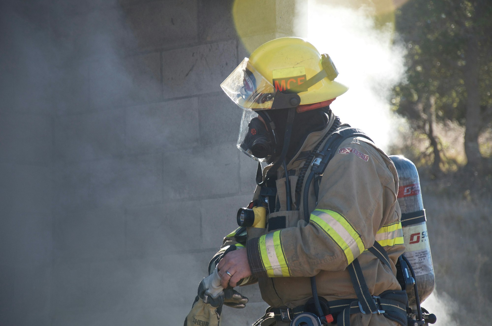 May contain: helmet, apparel, clothing, human, person, and fireman