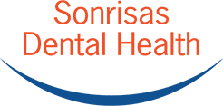 Text "Sonrisas Dental Health" above a blue curved line resembling a smile.