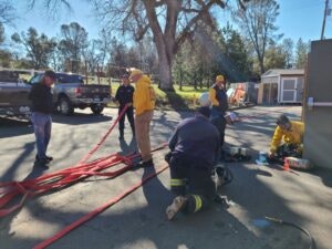 May contain: person, city, road, street, urban, adult, male, man, clothing, footwear, shoe, pickup truck, transportation, truck, and vehicle