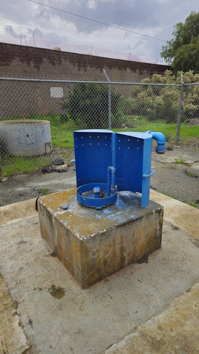 May contain: architecture, fountain, water, path, walkway, and slate