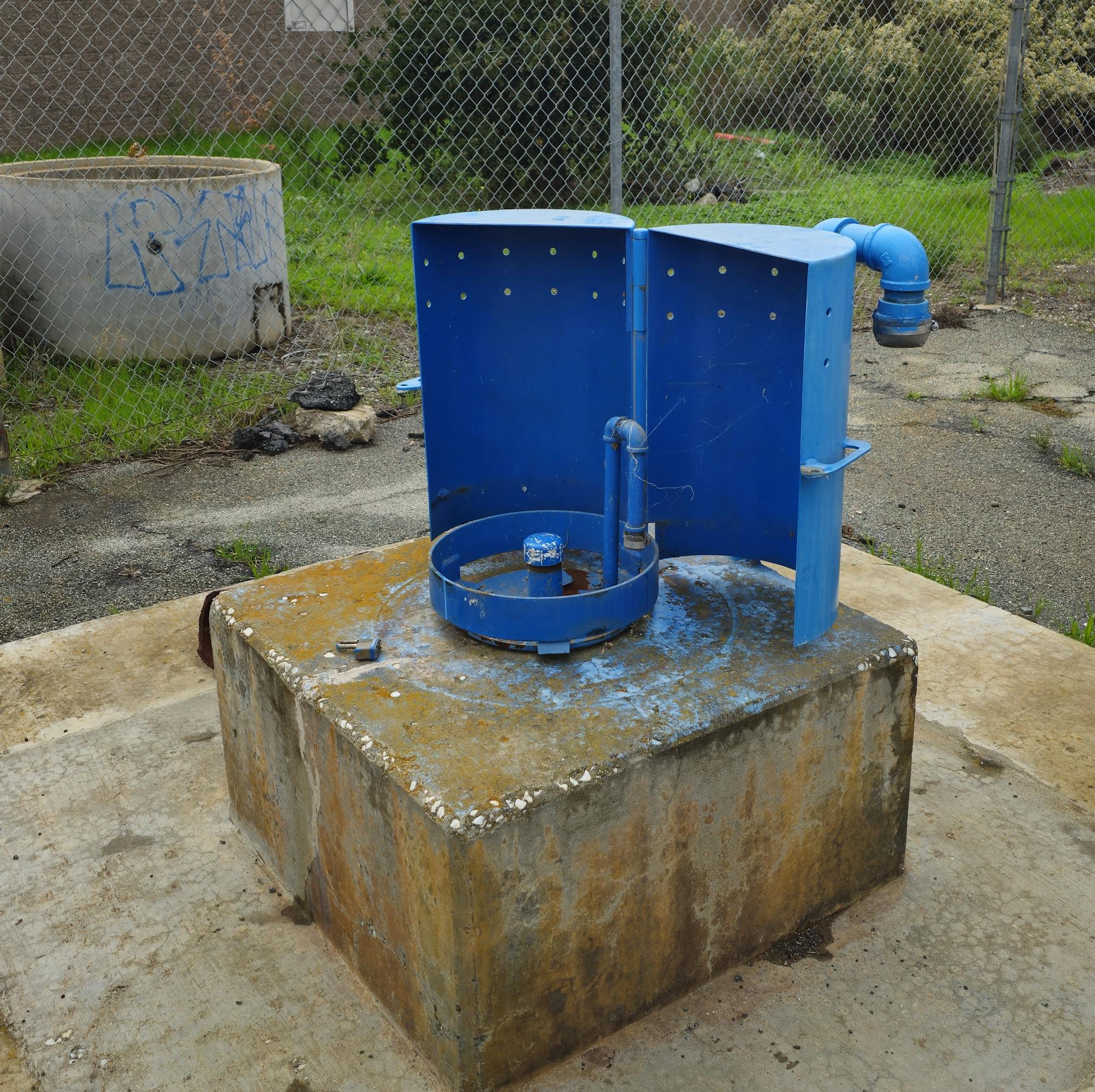 May contain: architecture, fountain, water, path, walkway, and slate