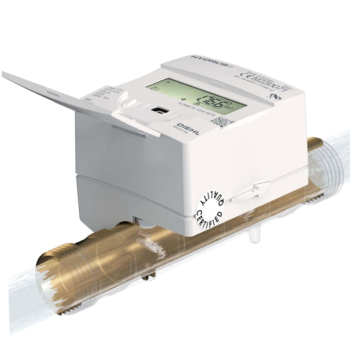 The image shows a digital water meter with a display for measuring water usage, mounted on a pipe.