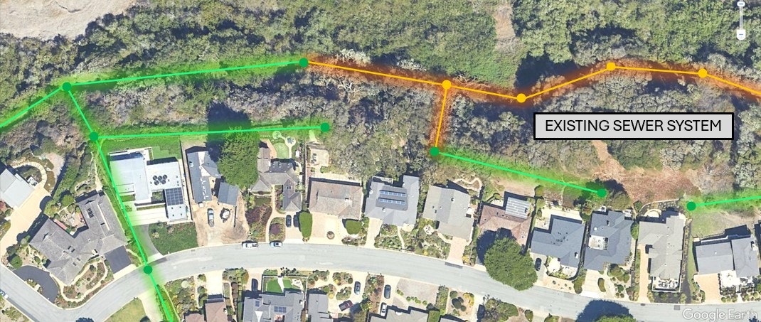 Aerial view of a neighborhood with green and orange lines depicting existing sewer system infrastructure.