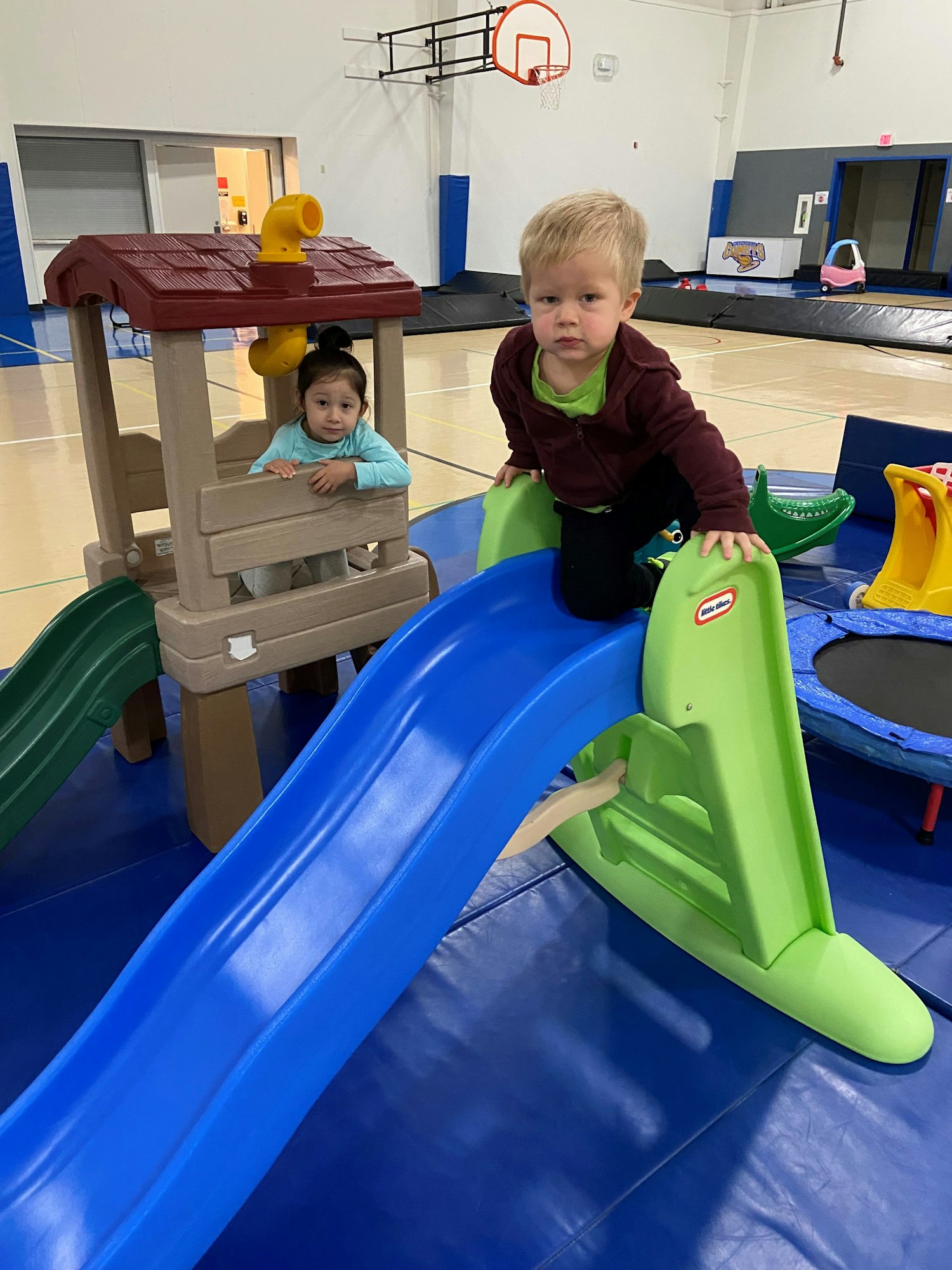 May contain: person, child, boy, male, and play area