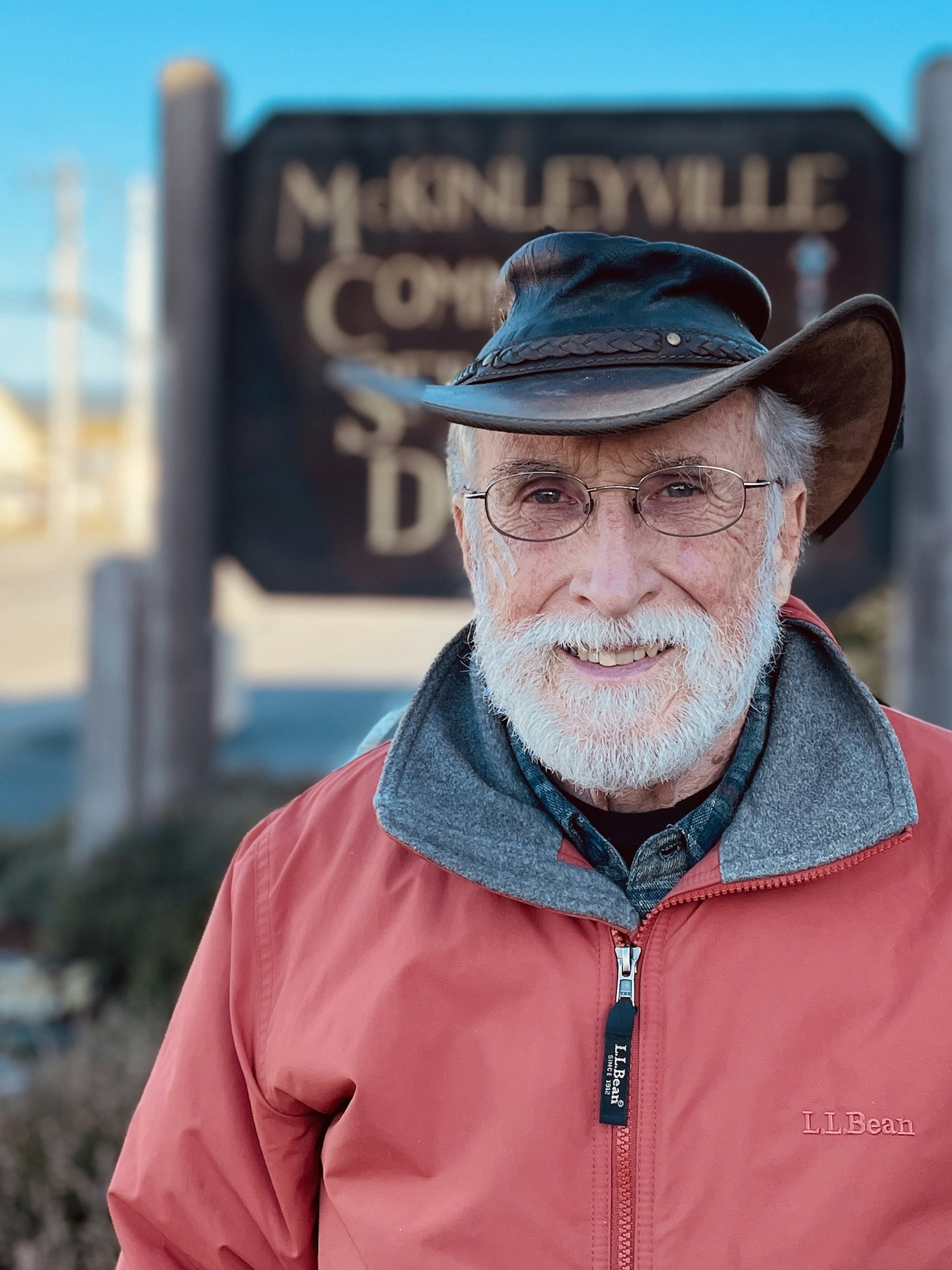 May contain: hat, clothing, sun hat, person, man, adult, male, face, head, jacket, coat, beard, glasses, and accessories
