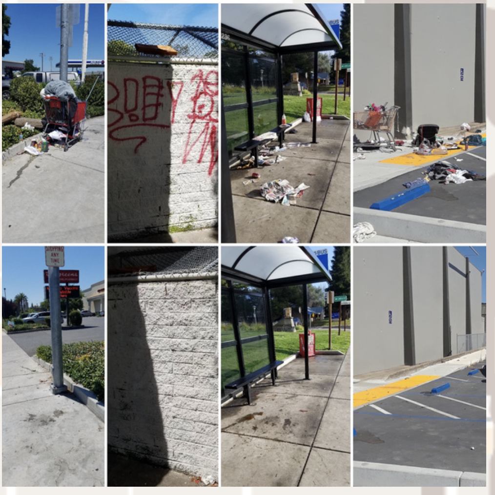An urban area showing a bus stop, graffiti, a shopping cart, litter, and a parking lot.