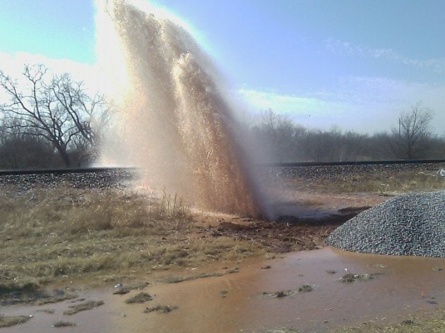 Broken Water Main, spouting water