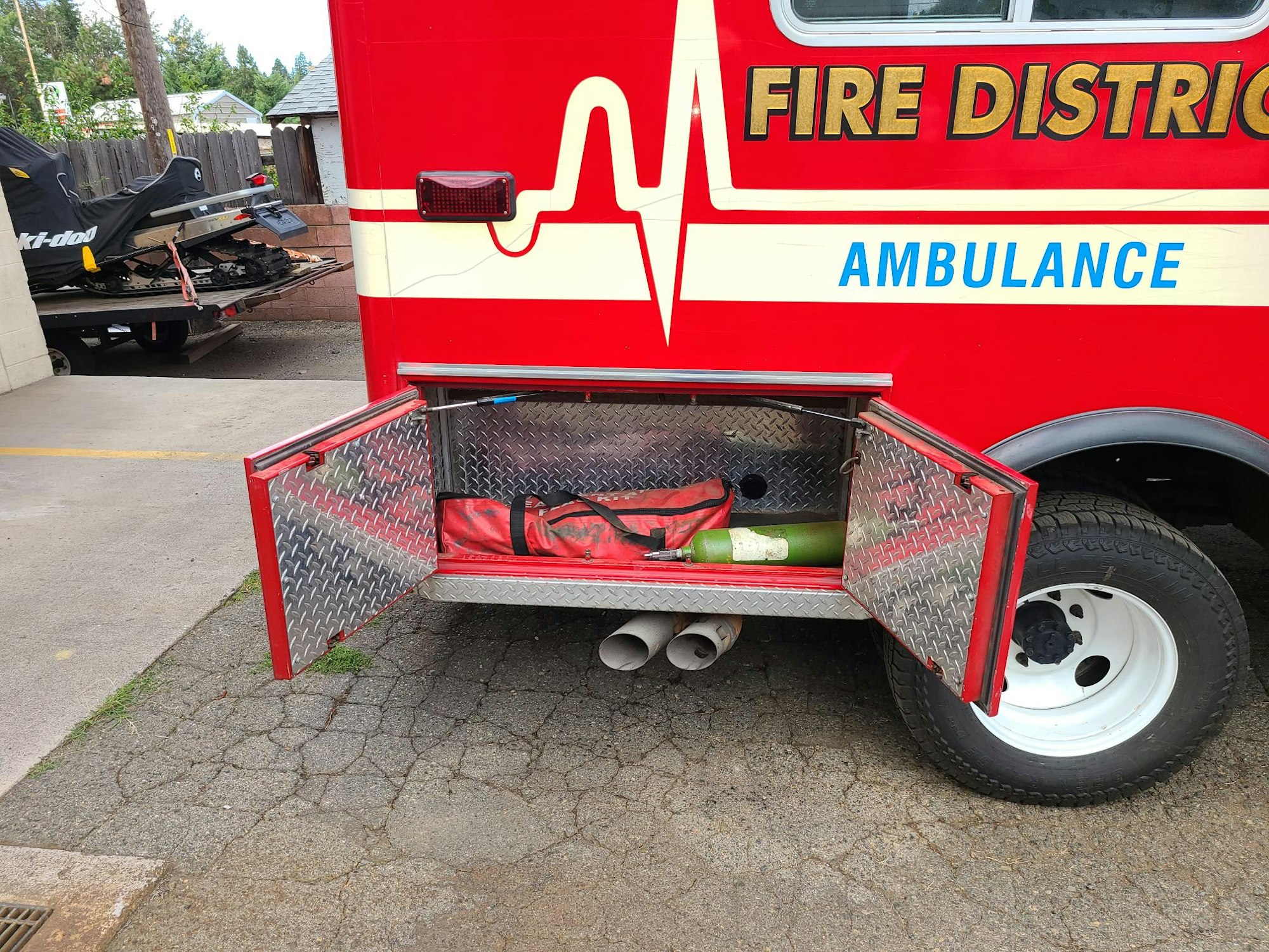 An ambulance compartment with medical supplies and equipment.