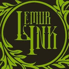 The image features the text "Lemur Ink" in a stylized green font surrounded by decorative elements on a dark background.