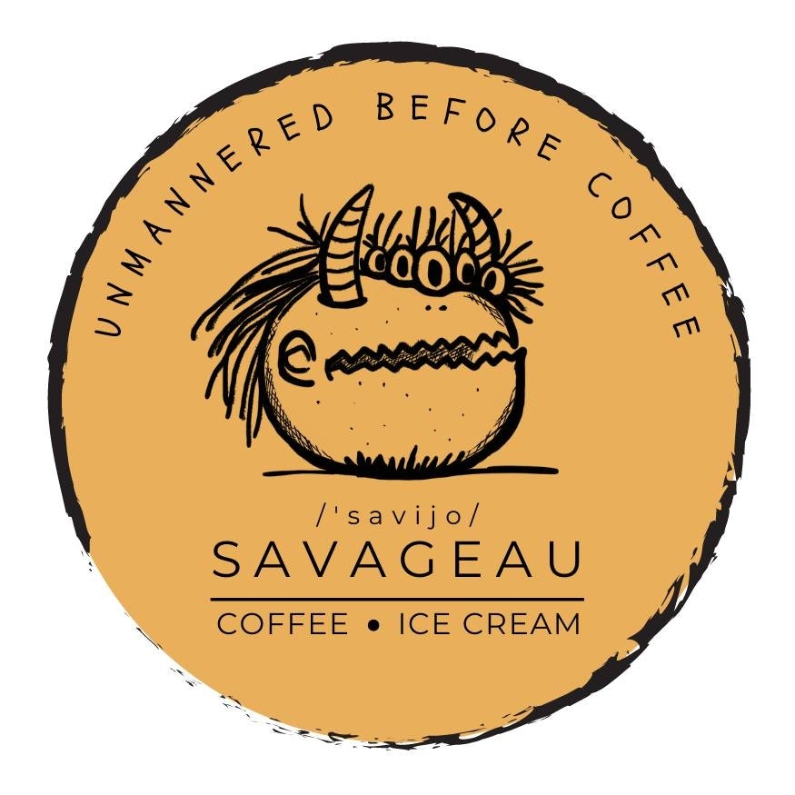 Stylized logo with text: "Savageau Coffee • Ice Cream" and "Unmannered Before Coffee." Illustrated face with horns and wild hair.