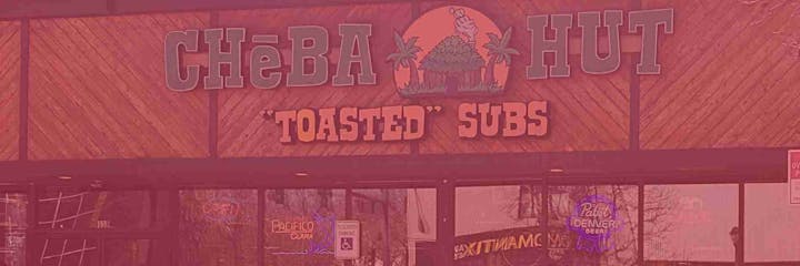 Storefront sign: "Cheba Hut Toasted Subs" with a hut and palm trees logo.