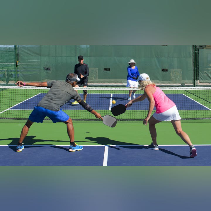 May contain: ball, sport, tennis, tennis ball, adult, female, person, woman, clothing, footwear, shoe, male, man, accessories, glasses, playing tennis, racket, tennis racket, and hat