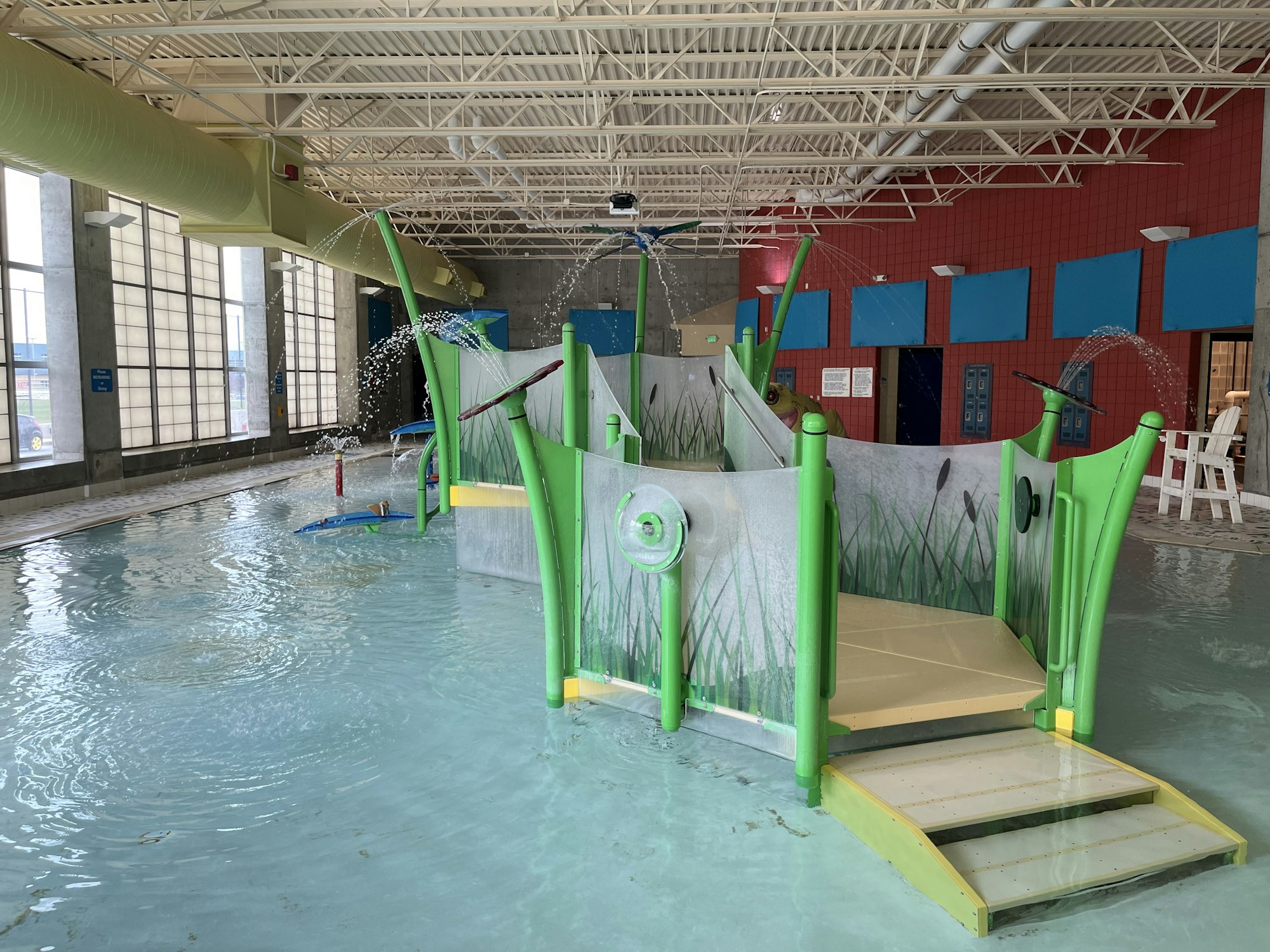 May contain: water, amusement park, water park, chair, furniture, car, transportation, and vehicle
