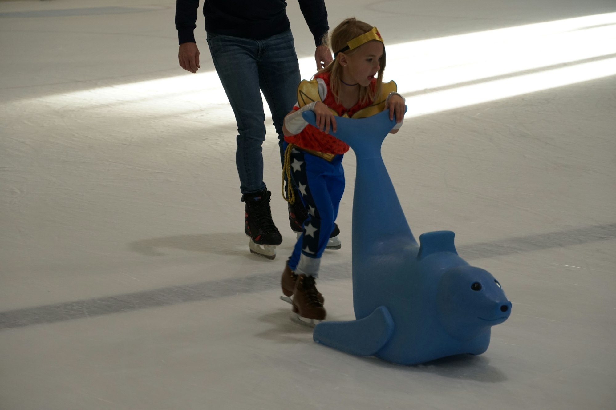 May contain: person, ice skating, ice skating dancing, performer, rink, skating, sport, clothing, footwear, and shoe