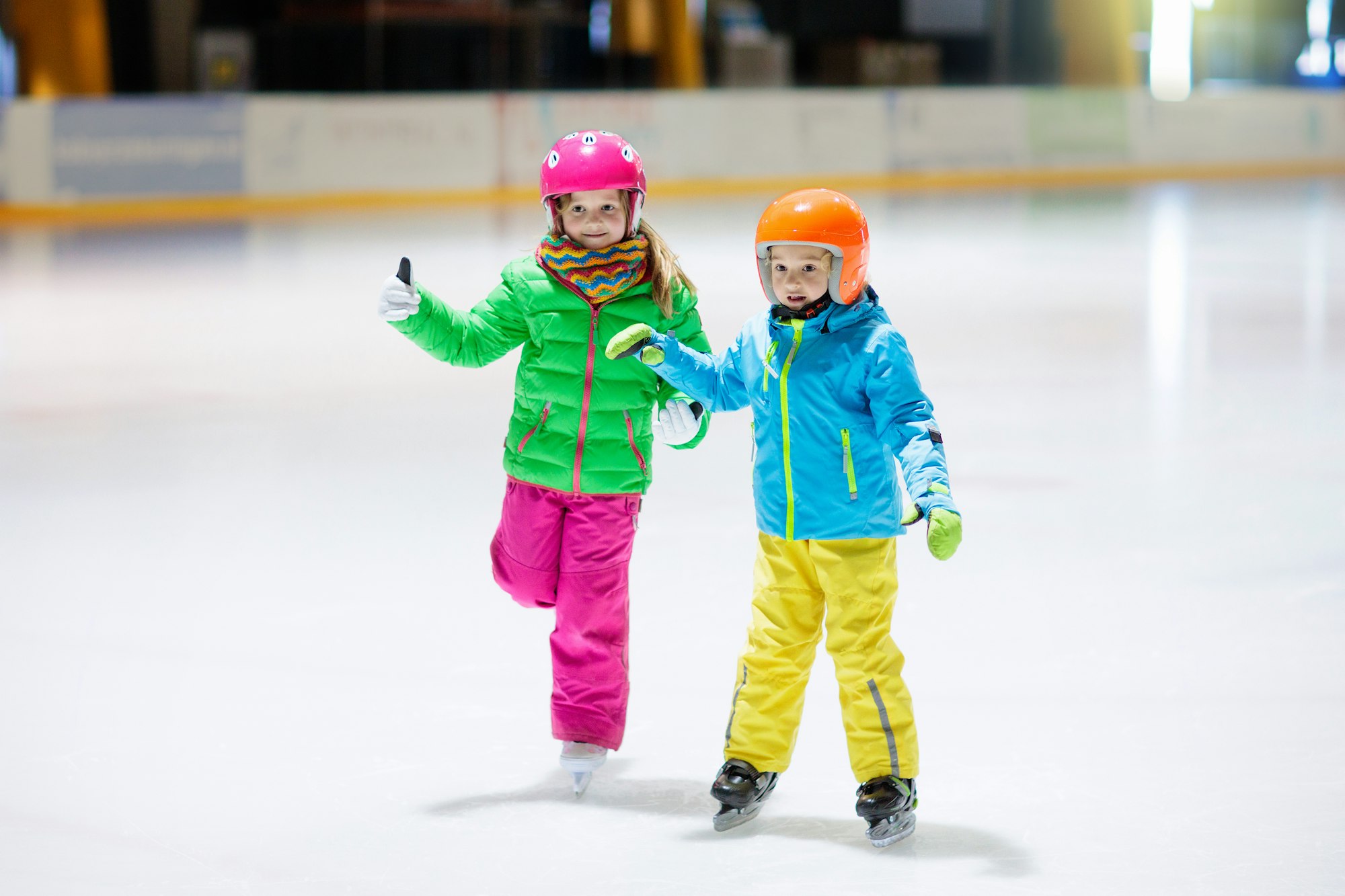 May contain: ice skating, ice skating dancing, performer, person, rink, skating, sport, helmet, clothing, glove, child, female, girl, boy, male, footwear, and shoe