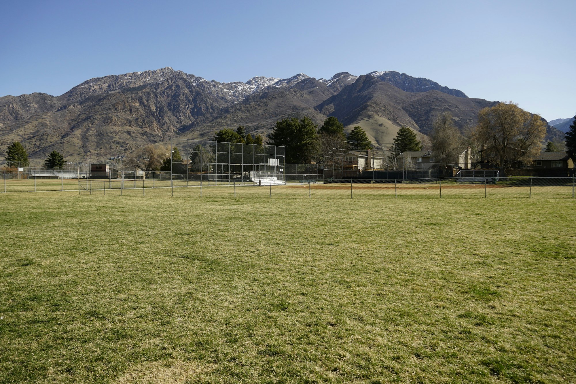 May contain: grass, plant, field, grassland, nature, outdoors, mountain, mountain range, park, countryside, farm, pasture, and rural