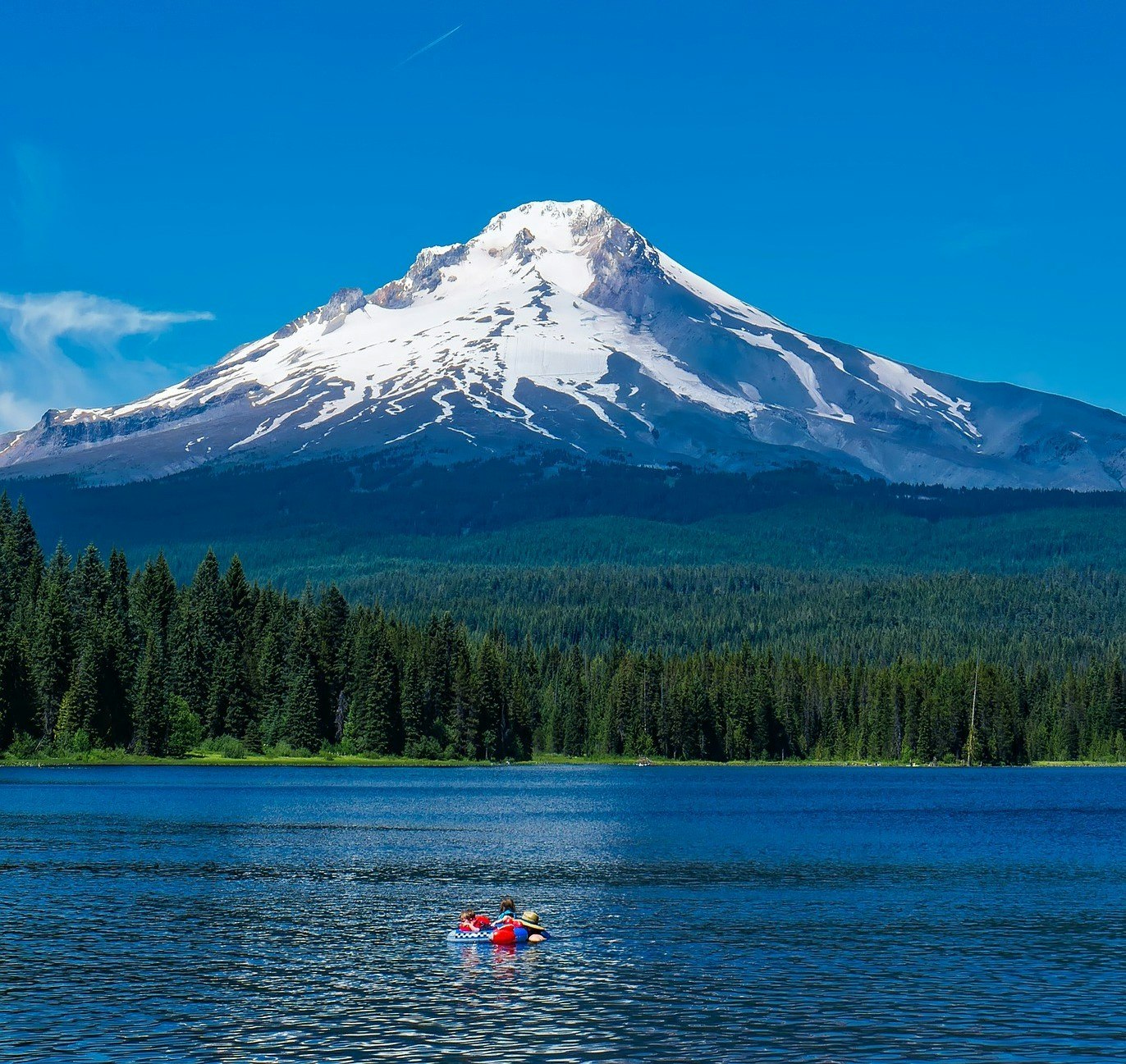 Trillium Lake with raft and Mt Hood