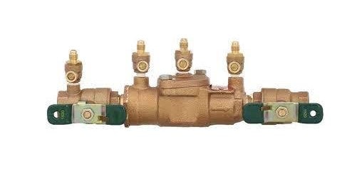 Brass water valve with multiple connections and handles, likely a backflow preventer.