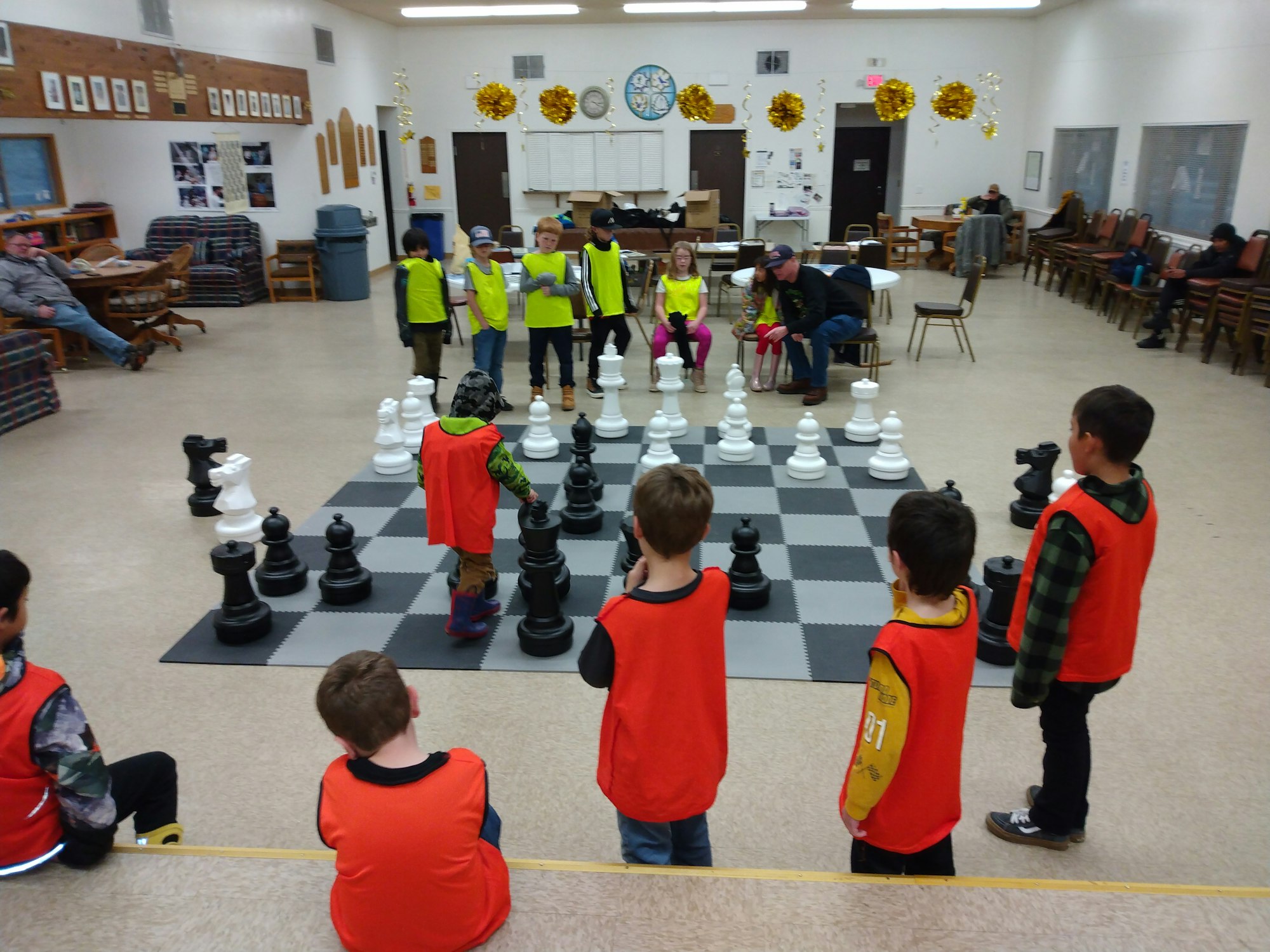 May contain: boy, child, male, person, chess, and game