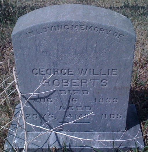 A gravestone for George Willie Roberts, died August 16, 1899, aged 25 years, 4 months, 11 days.