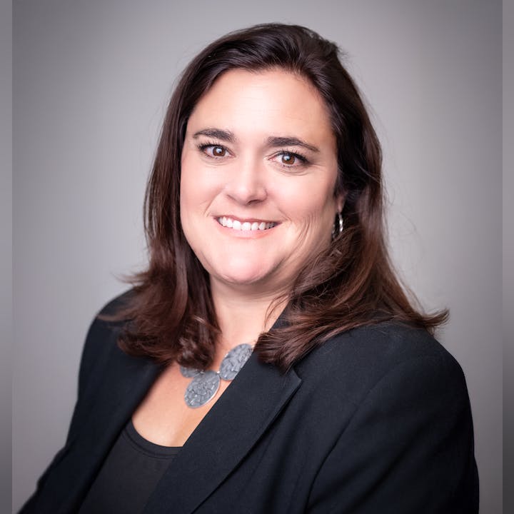 Board Member Marisa Pacheco smiling at the camera.