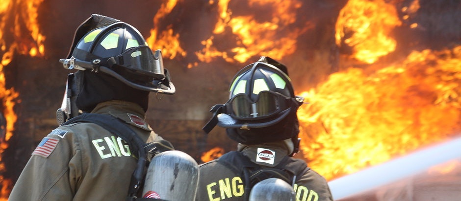 May contain: helmet, person, and fire