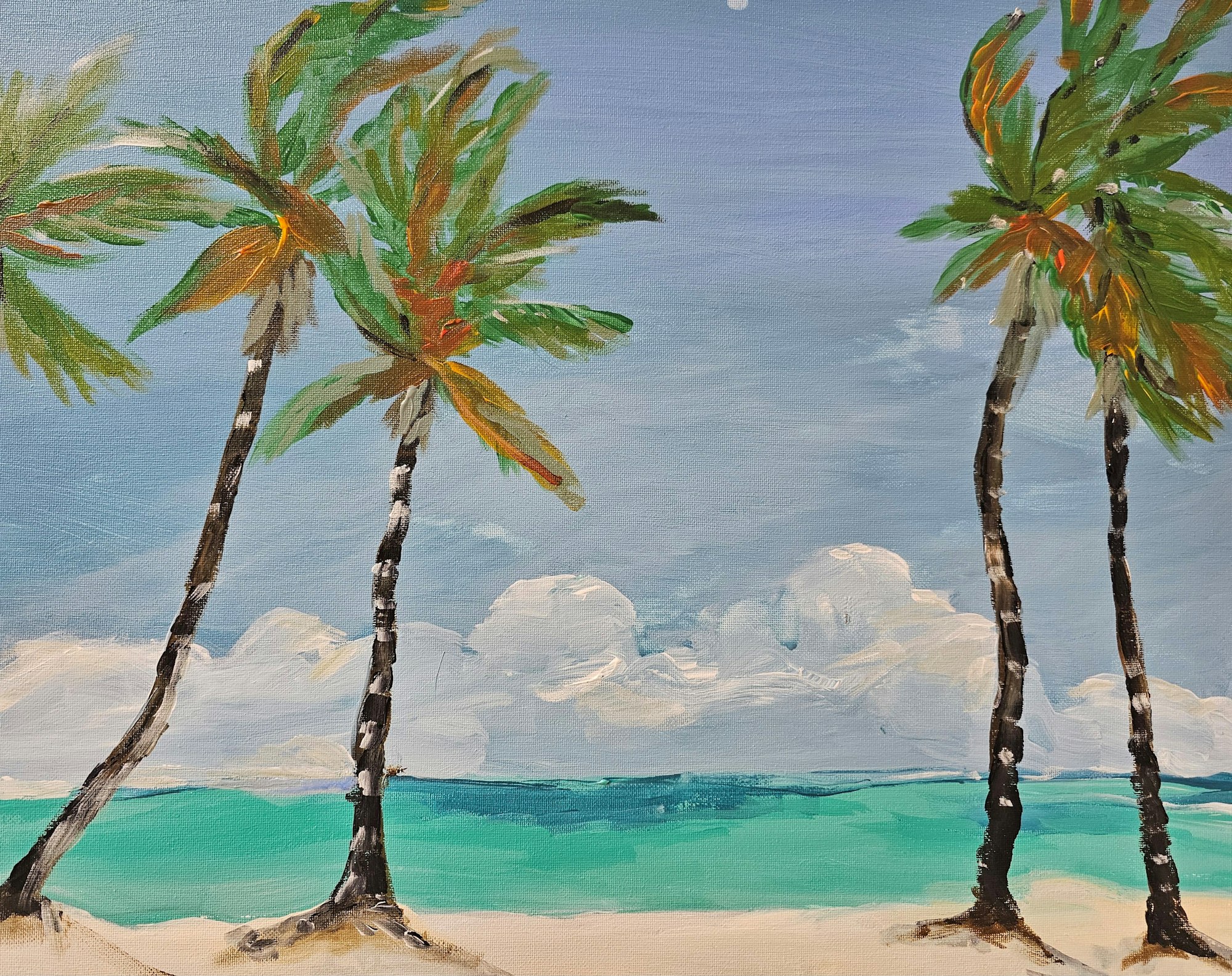 Four palm trees on a beach with a blue sky and ocean in the background.