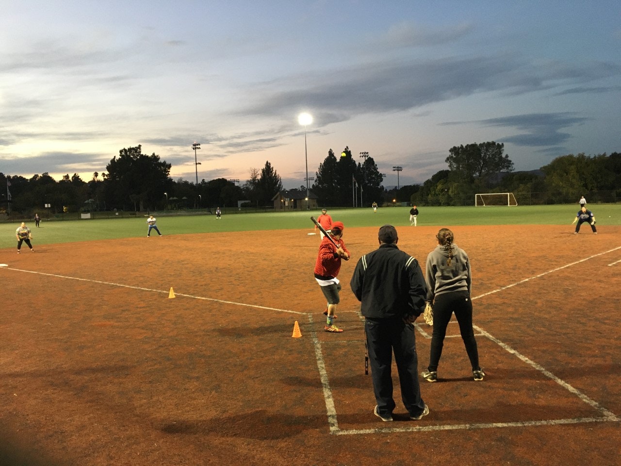 May contain: person, human, building, people, baseball field, arena, team sport, sport, team, baseball, sports, and softball