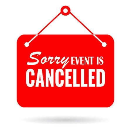 A red sign stating "Sorry, EVENT IS CANCELLED" with a hanging design.