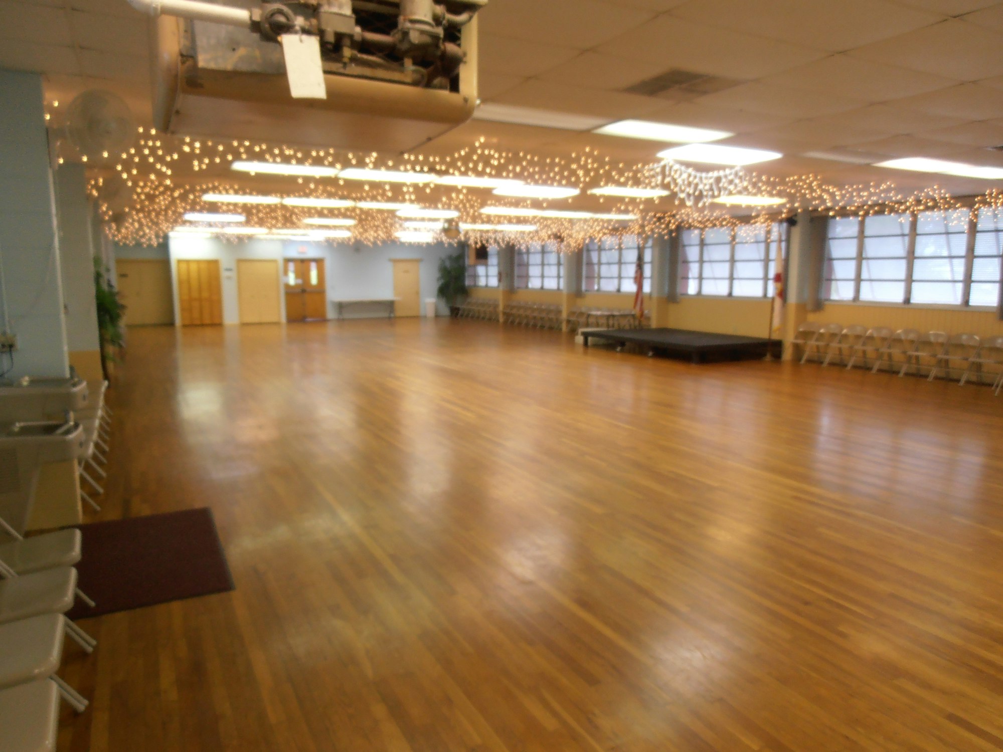 May contain: floor, indoors, room, ballroom, wood, and hardwood