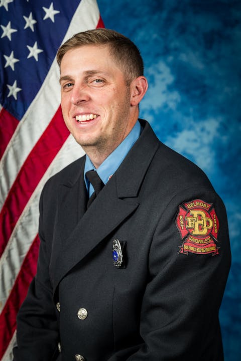 Lt./EMT Russell Davis 2024 Photo in front of US Flag