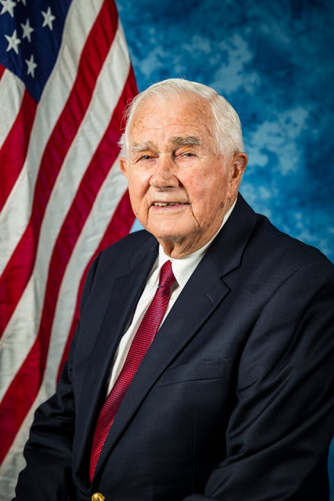 Trustee Robert Wilson with US Flag